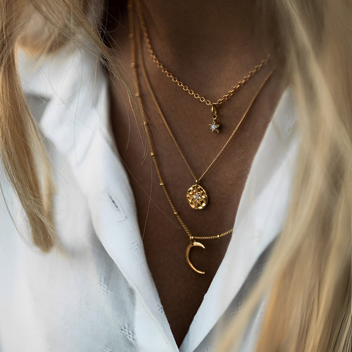 Tips and Tricks for Effortlessly Chic Necklace Stacking: How to layer necklaces like a pro